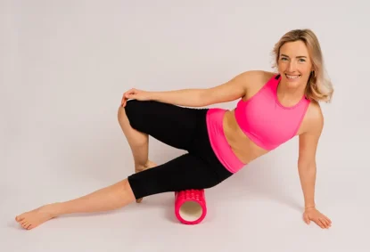 attractive-blonde-caucasian-smiling-woman-isolated-white-blue-studio-shot-looking-camera DOMS: Tips to Ease Post-Workout Pain